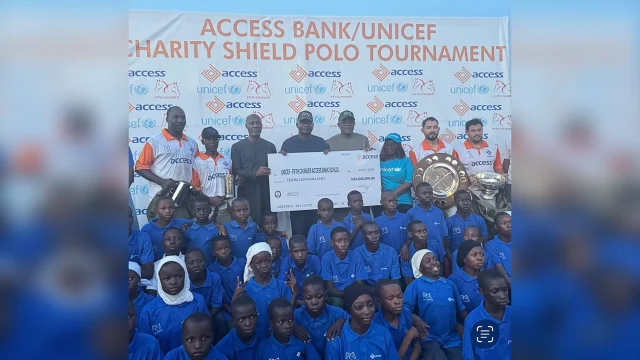 Access Bank’s Managing Director/Chief Executive Officer, Roosevelt Ogbonna (left); Minister of Defence, General Christopher Musa; Fifth Chukker Polo & Country Resort’s Adamu Atta; representative of UNICEF; winners of the 2026 Charity Shield and school children at the Charity Shield tournament’s cheque presentation ceremony in Kaduna on Sunday.