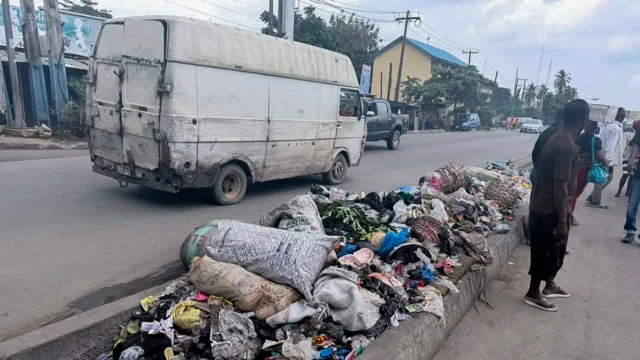 Littered waste on major roads in Iyana-Isolo, and Okota, Lagos.		                				        PHOTO: ENIOLA DANIEL 