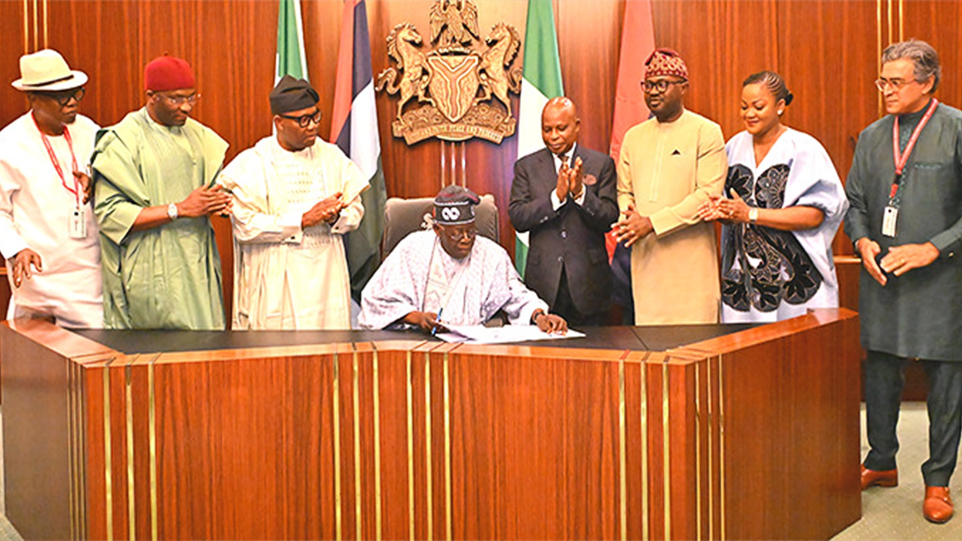 Leader, House of Representatives, Julius Ihonvbere (left); Deputy Speaker, House of Representatives, Benjamin Kalu; Senate President, Godswill Akpabio; President Bola Ahmed Tinubu; Minister of Justice and Anthony General of the Federation, Lateef Fagbemi; Minister of Interior,  Olubunmi Tunji-Ojo; Director General and Chief Executive Officer, National Identity Management Commission(NIMC), Abisoye Coker-Odusote and Operation Manager, Word Bank, Taimur Samad during the Presidential Assent to National Identity Management Commission (NIMC) Act 2026 held at the Presidential Villa, Abuja… on Friday.      PHOTO: STATE HOUSE