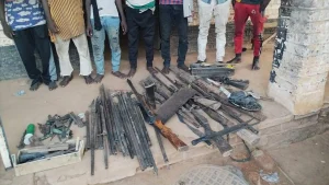 Suspects with recovered weapons