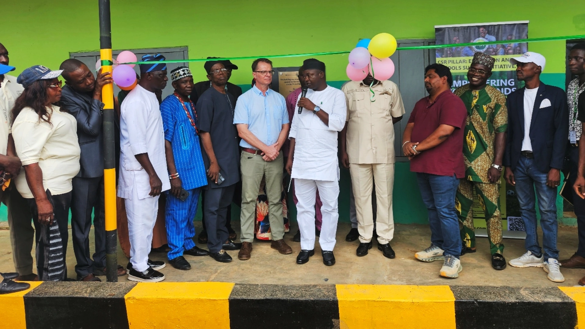 Government officials, community leaders, and Rex Forestry representatives at the official handover ceremony.