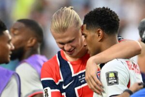 Norway’s forward #09 Erling Braut Haaland (L) congratulates England’s midfielder #10 Jude Bellingham at the end of the 2026 World Cup football tournament quarter-final match between Norway and England at Miami Stadium in Miami on July 11, 2026. (Photo by ROBERTO SCHMIDT / AFP)