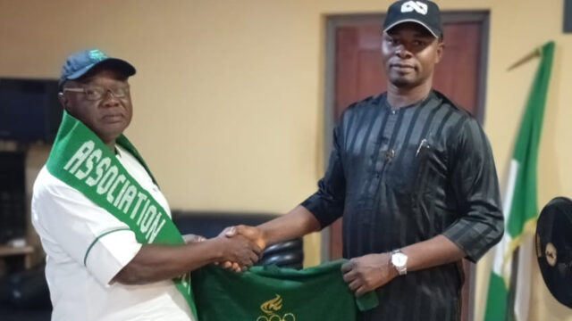 Olympian Emmanuel Oshomah with the Acting Chairman of Etsako East Local Council, Sunny Ekpetika Ekpeson