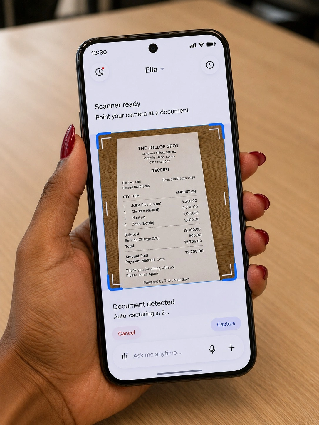 Image of a hand holding a Tecno smartphone with the EllaClaw interface active.
