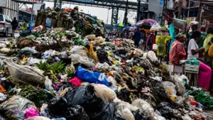 Heaps of refuse in Oshodi, Lagos, yesterday. 				              PHOTO: AYODELE ADENIRAN