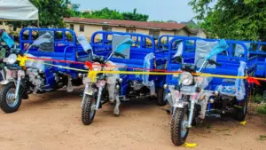 IFAD-VCDP hands Over 16 Tricycles to farmers