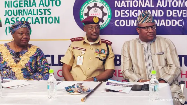 Deputy Director/Head of Public Relations, National Automotive Design and Development Council (NADDC), Susan Bisong Taiwo (left); Corps Marshal and Chief Executive of the Federal Road Safety Corps (FRSC), Shehu Mohammed; Deputy Managing Director of CFAO Motors Nigeria Limited, Kunle Jaiyesimi at the third Nigeria Auto Industry Summit (NAISU) in Lagos, yesterday.