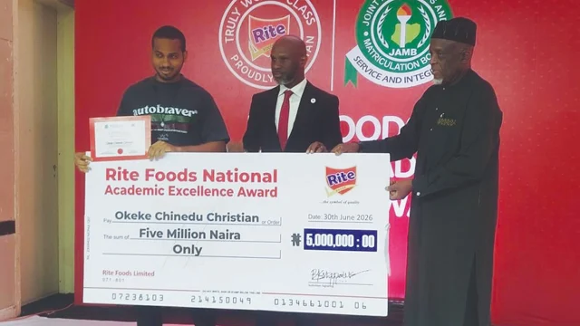 Overall best scorer with 93.8 per cent, Okeke Chinedu Christian (left), Managing Director, Rite Foods, Seleem Adegunwa and Registrar, Joint Admissions and Matriculation Board, Prof Is’haq Oloyede at the award presentation in Lagos