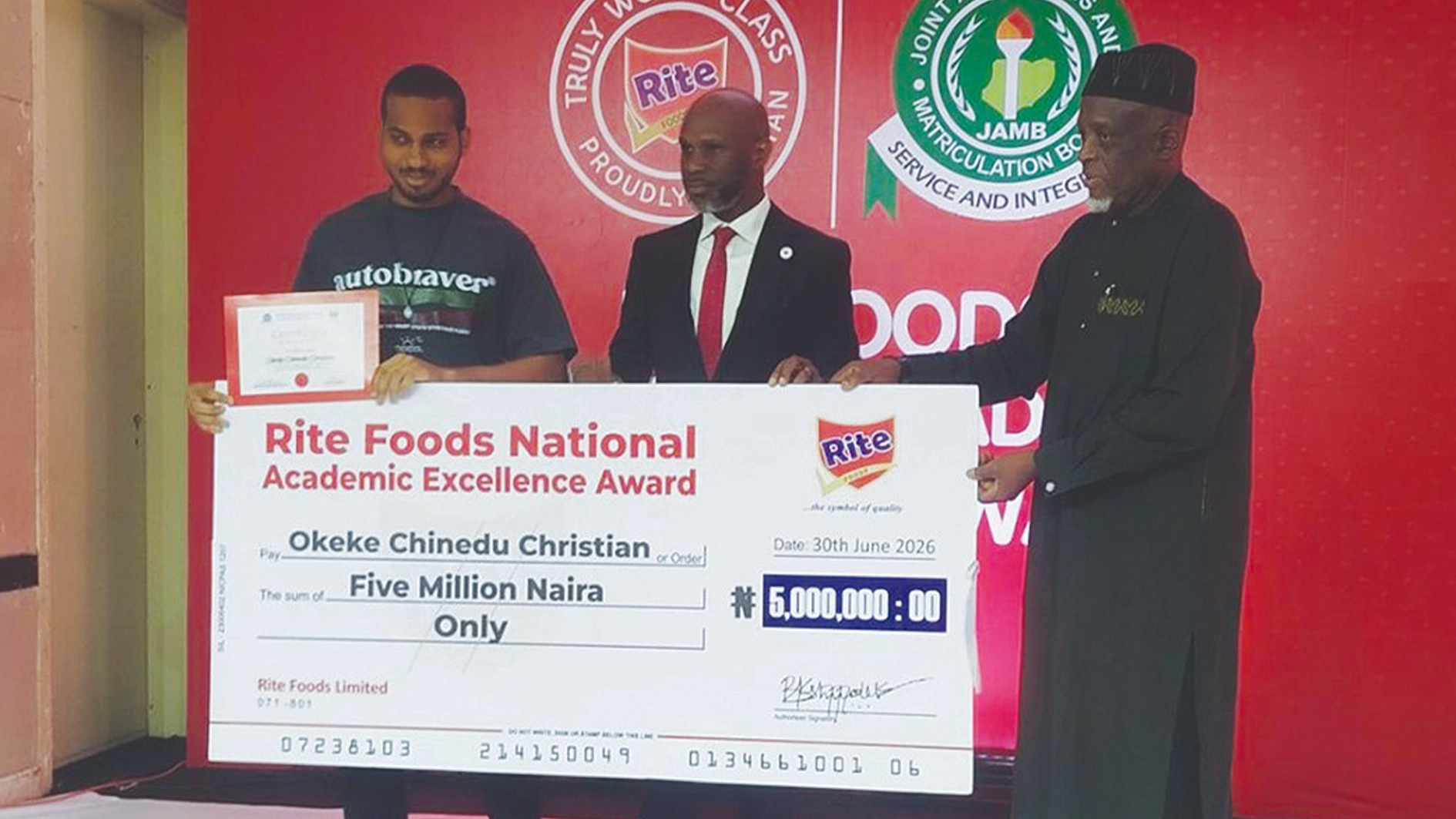 Overall best scorer with 93.8 per cent, Okeke Chinedu Christian (left), Managing Director, Rite Foods, Seleem Adegunwa and Registrar, Joint Admissions and Matriculation Board, Prof Is’haq Oloyede at the award presentation in Lagos