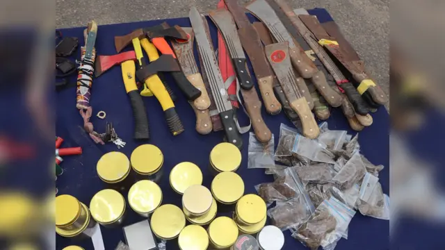 Some recovered drugs, arms and cutlasses