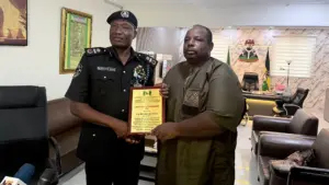 AIG Jimoh and Dr. Wole Odunsin during the award presentation… PHOTO: ENIOLA DANIEL