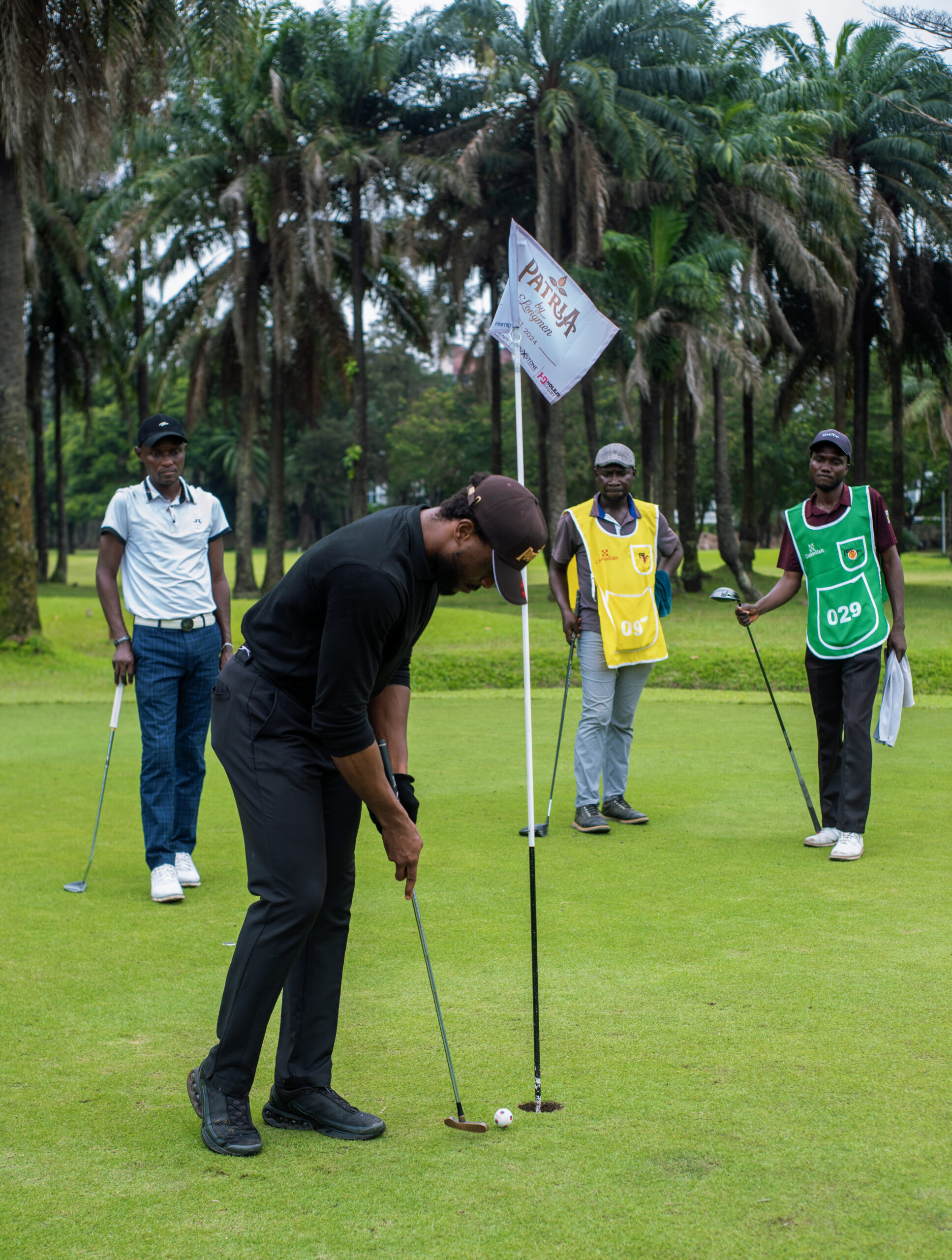 Co-founder of Patria by Longmen, Elvis Sampson-Achonu, takes a putt during the Patria Golf Kitty at Ikoyi Club 1938, Lagos. Credit: Kessiena Victory and Oluwadamilola Oloyede