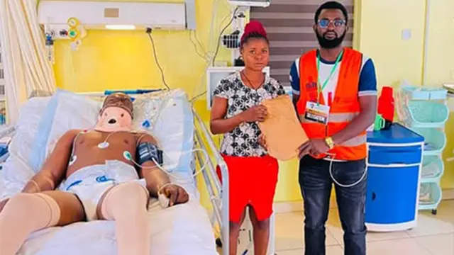 Victim of Otukpo attack,  Mr Sunday Owoicho (left); his wife, Josephine  and Mr Andy Nomsoor during  a presentation of donation at the National Hospital, Abuja.