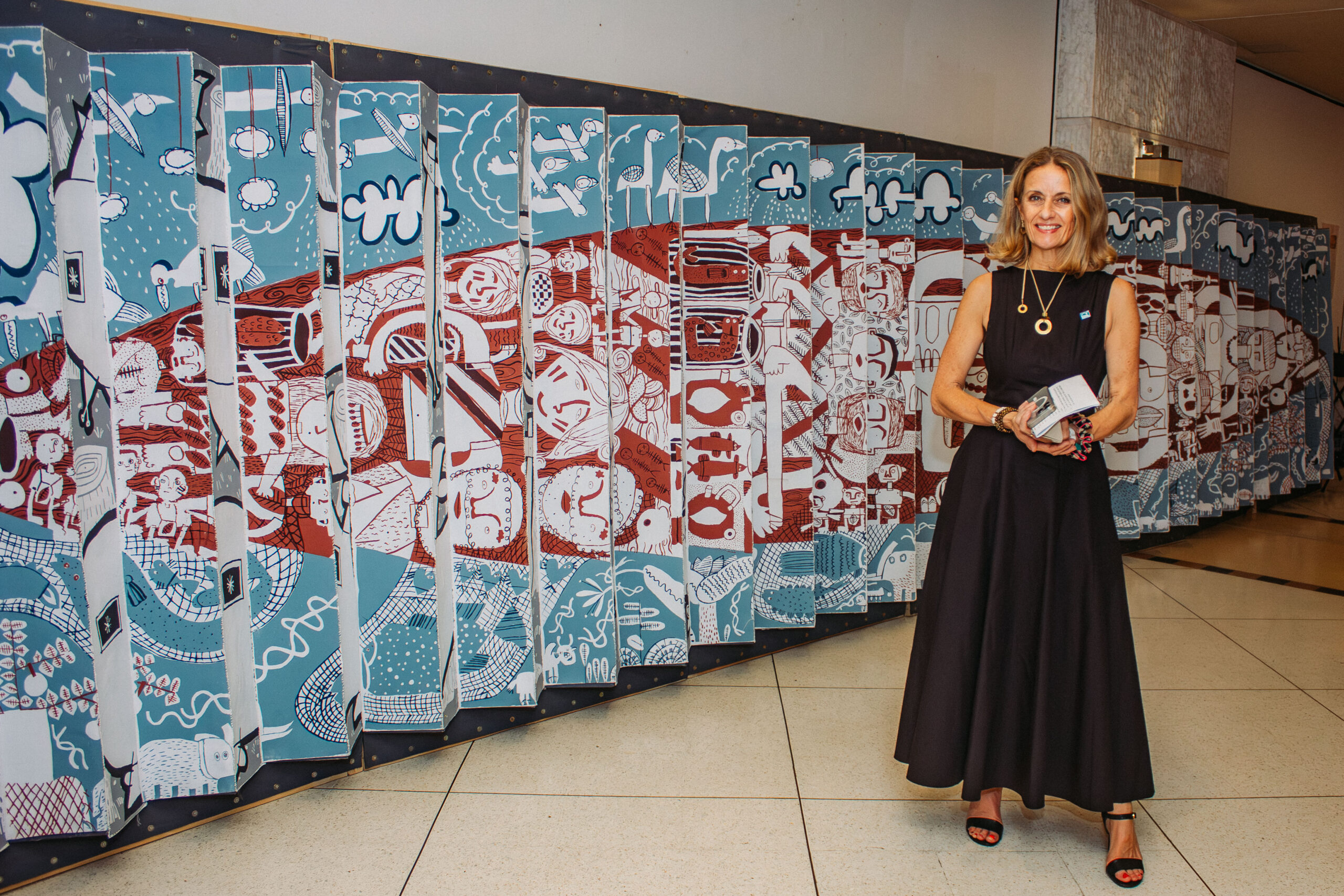 Founder and Convenor of Lokoja Dialogues, Polly Alakija, beside an art installation during Stories of a Broken Water Cycle at the Federal Palace Hotel, Lagos