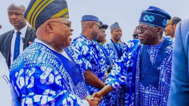 President Bola Ahmed Tinubu shares a warm exchange with Governor Ademola Adeleke, amid the celebration of Adeleke’s victory in the Osun State governorship election.