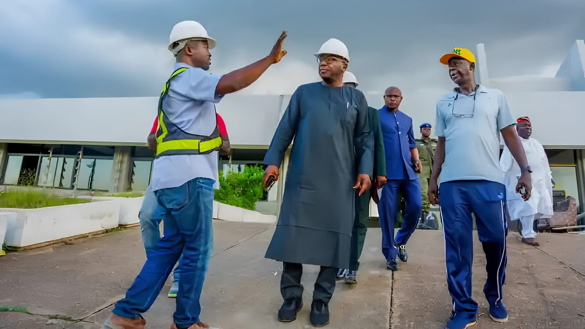 Kwara Governor AbdulRahman AbdulRazaq inspects a sports facility.
