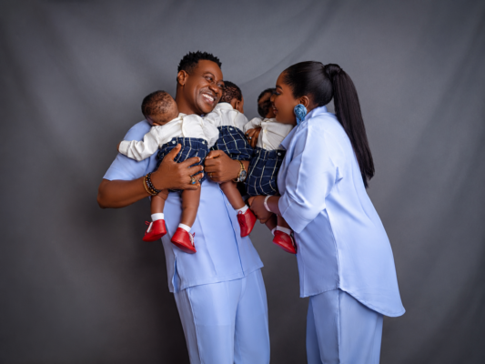Lateef Adedimeji and his wife, Mo Bimpe with their triplet sons