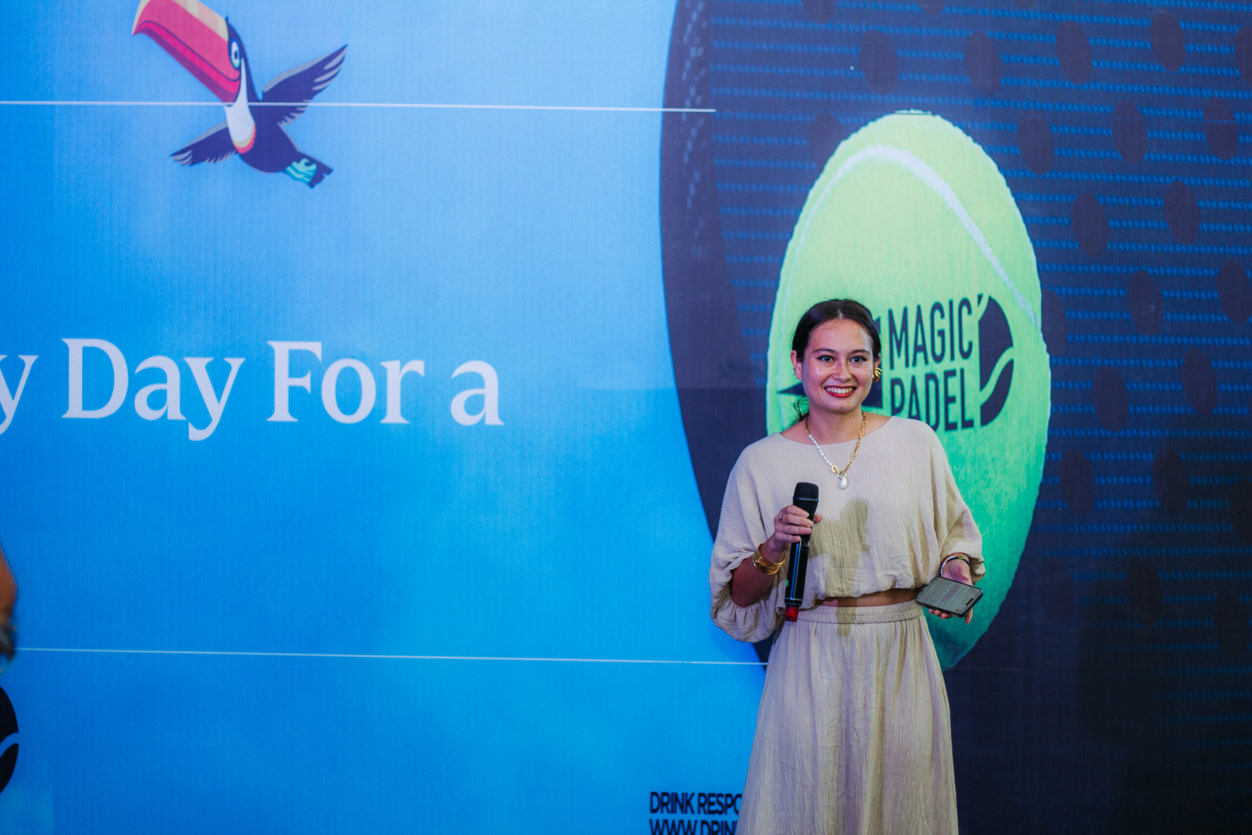 Operations Manager of Magic Padel, Maya Semaan, addresses guests during the Guinness Nigeria and Magic Padel partnership event at the Federal Palace Hotel, Lagos.