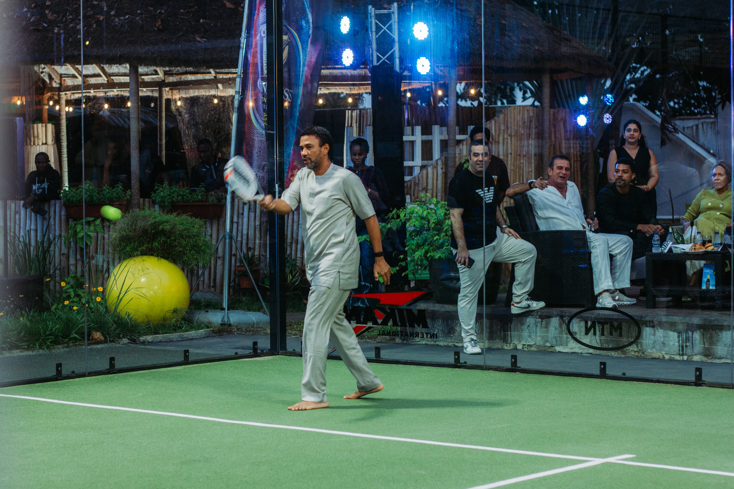Chief Executive Officer of MTN Nigeria, Karl Toriola, in action on the court during the Guinness Nigeria and Magic Padel partnership event at the Federal Palace Hotel, Lagos.