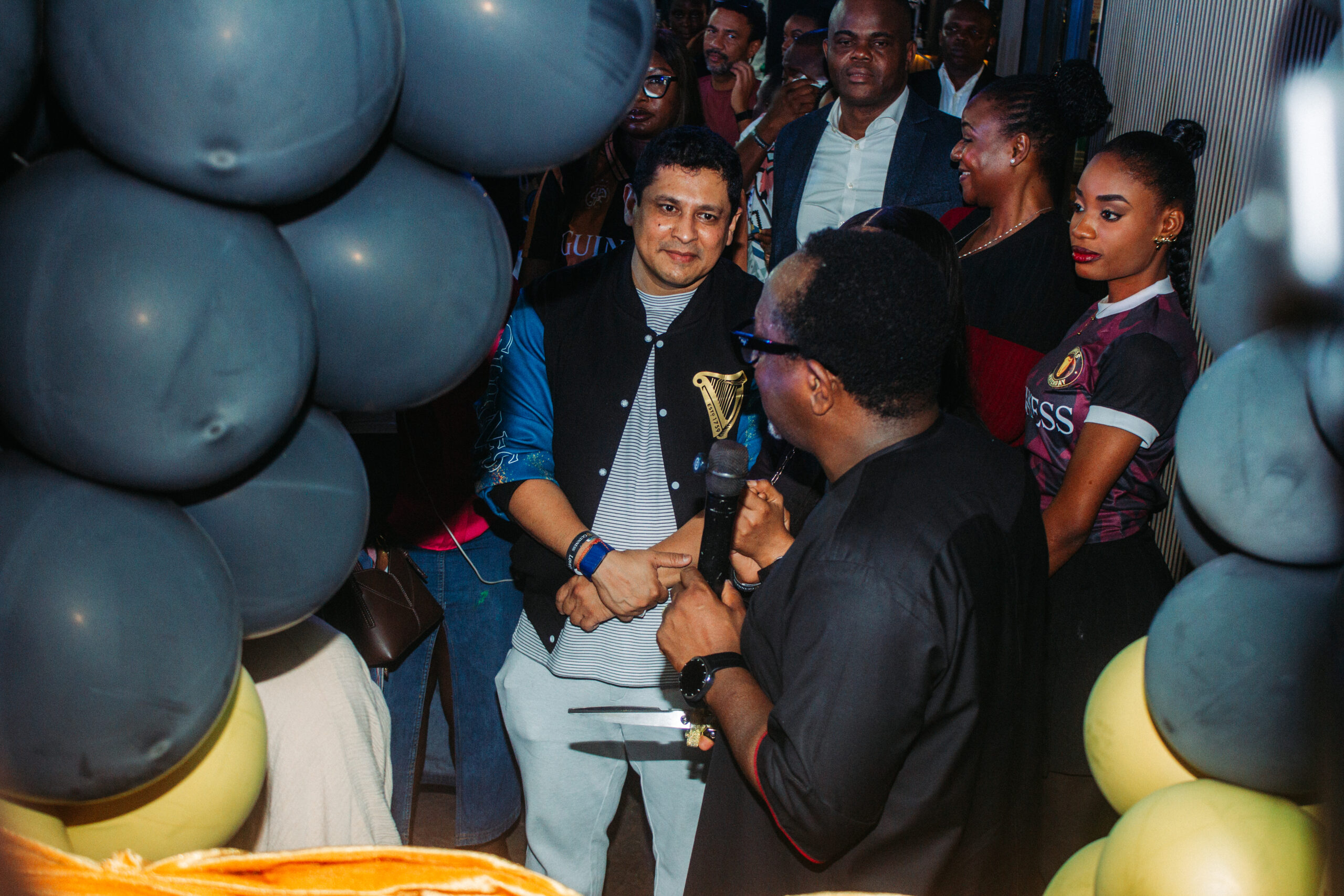 Managing Director and Chief Executive Officer of Guinness Nigeria Plc, Girish Sharma, listens as the company’s Board Chairman, Professor Fabian Ajogwu, SAN, speaks during the opening of the new Guinness bar at Magic Padel, Federal Palace Hotel, Lagos.