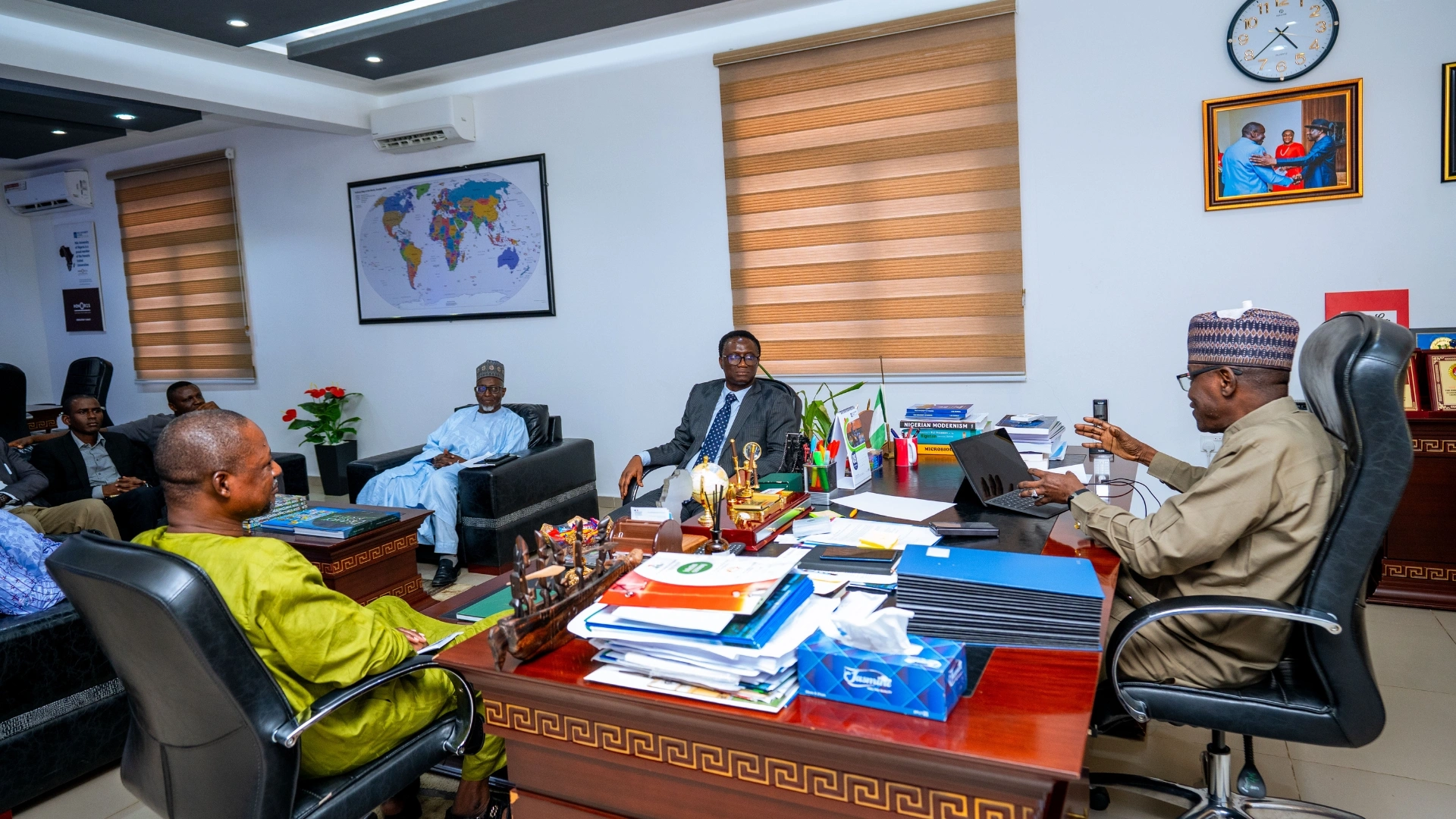 Professor Dilli Dogo meets Professor Pierre Gomez during the NUC tour of Nile University of Nigeria.