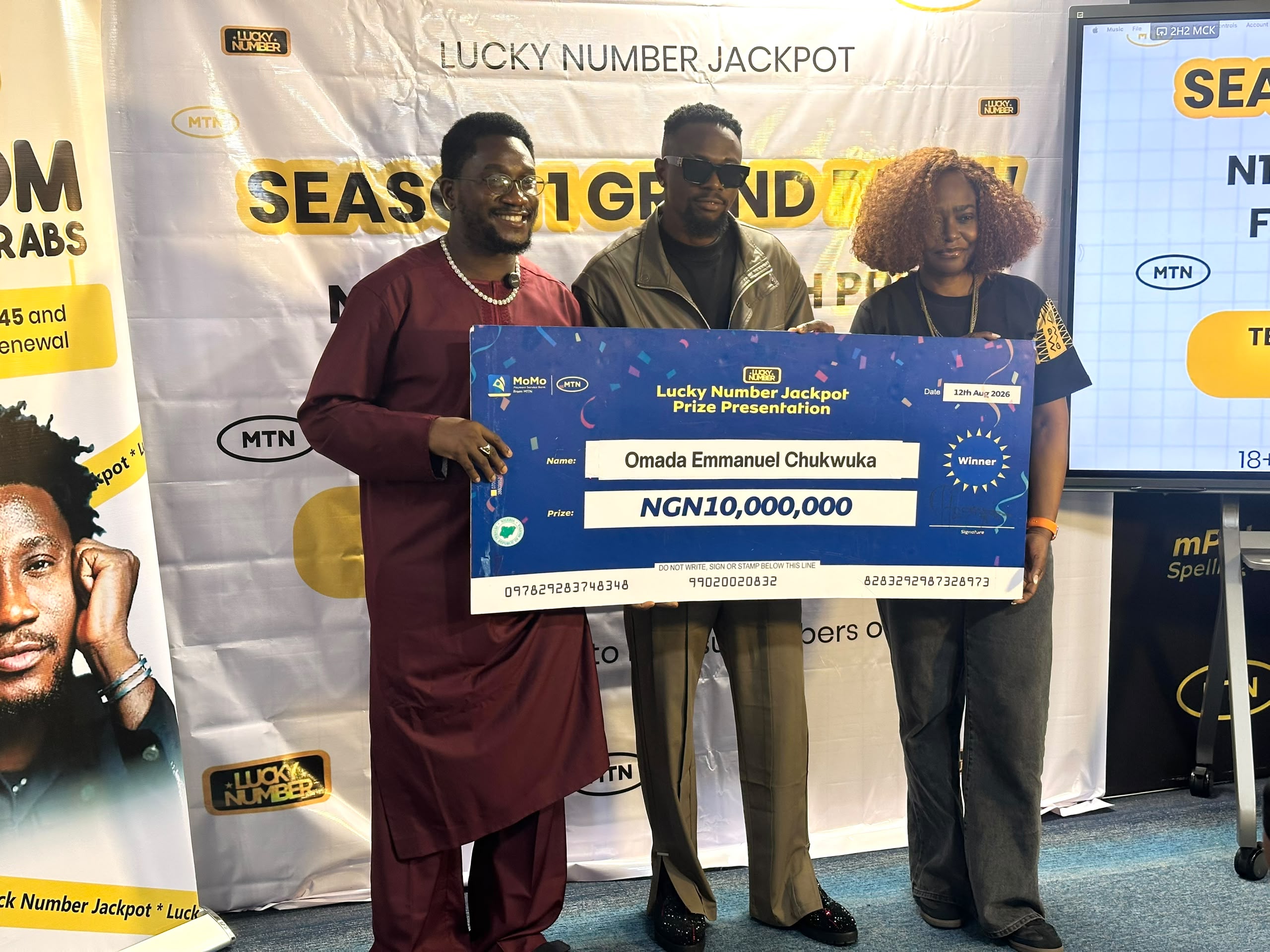 Lawal Michael Nasiru, popularly known as Nas Boi, beneficiary of the MTN lucky jackpot, Omada Emmanuel, and Chief Digital Officer, MTN Nigeria Aisha Mumuni