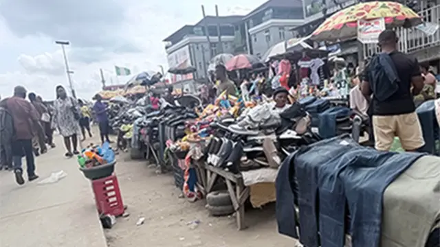 Street traders at Oshodi Road and Ariyibi Street yesterday.            				 PHOTOS:  ENIOLA DANIEL aand CLEMENT AYONOTE