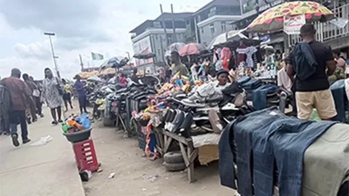 Street traders at Oshodi Road and Ariyibi Street yesterday.            				 PHOTOS:  ENIOLA DANIEL aand CLEMENT AYONOTE