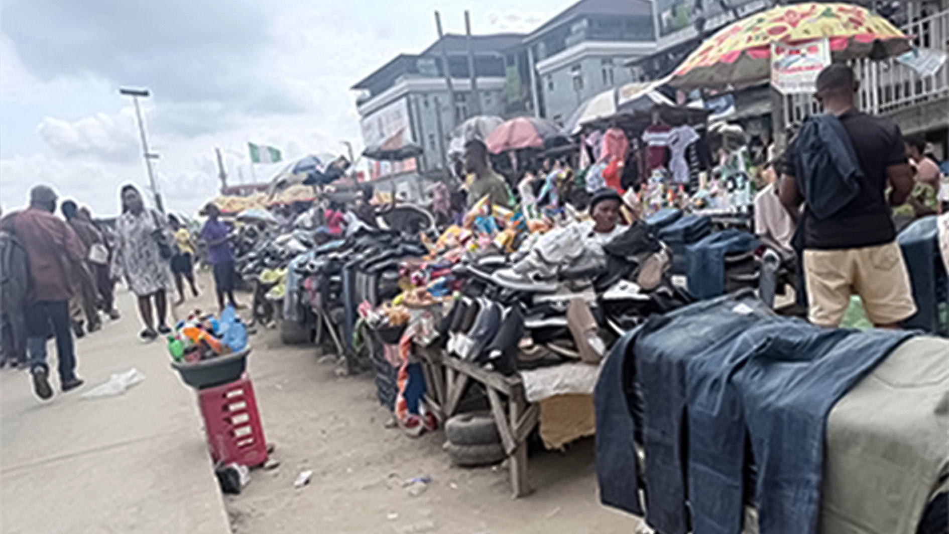 Street traders at Oshodi Road and Ariyibi Street yesterday.            				 PHOTOS:  ENIOLA DANIEL aand CLEMENT AYONOTE