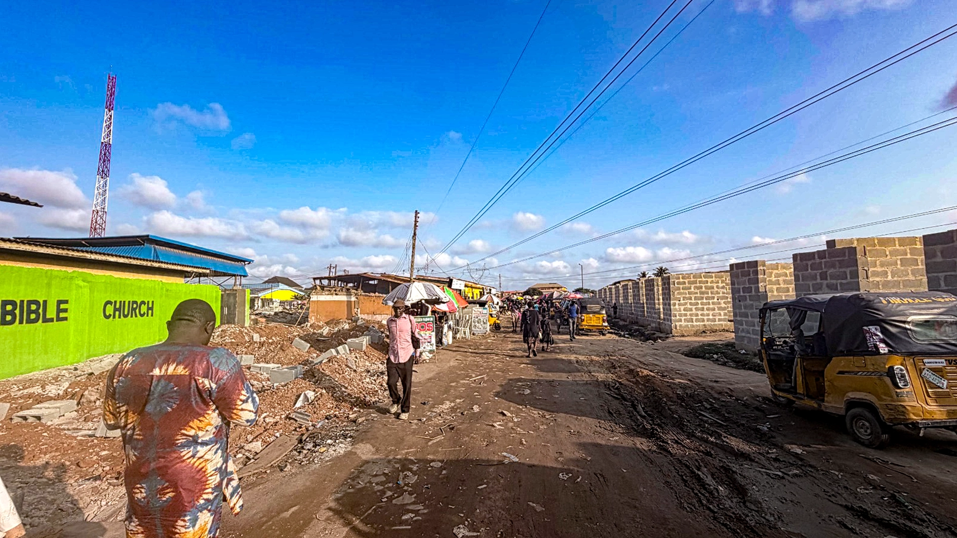 Ongoing construction of shops under the high tension wire yesterday. 	                  PHOTO: ENIOLA DANIEL