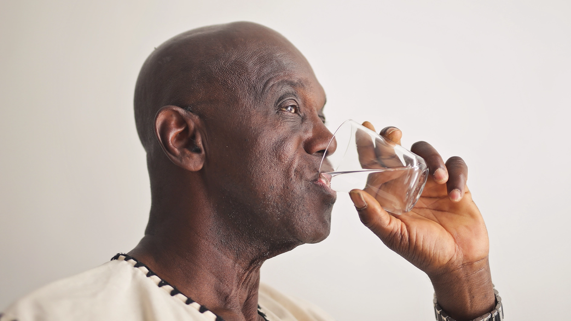 A senior drinking water