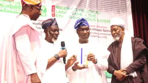 Chairman, 7th National Discourse Planning Committee (left), Alhaji Ismail Ozugha; Chairman, Board of Trustees, The Companion, Alhaji Waliu Onibon; Lagos State Deputy Governor, Dr. Kadri Obafemi Hamzat and National Amir, The Companion, Imam Nojeem Jimoh at the 7th National Discourse Organized by The Companion held at the J.F Ade Ajayi Auditorium, University of Lagos (UNILAG), Akoka, Yaba, Lagos, on Sunday
