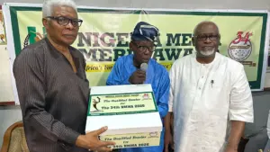Member, NMMA Board of Trustees, Dele Adetiba (left);  Chairman of the Board, Dayo Duyile and Chief Administrator of the awards, Yemi Akeju, at the formal presentation of the NMMA 2026 entries to the Chairman Panel of Assessors in Lagos, recently.