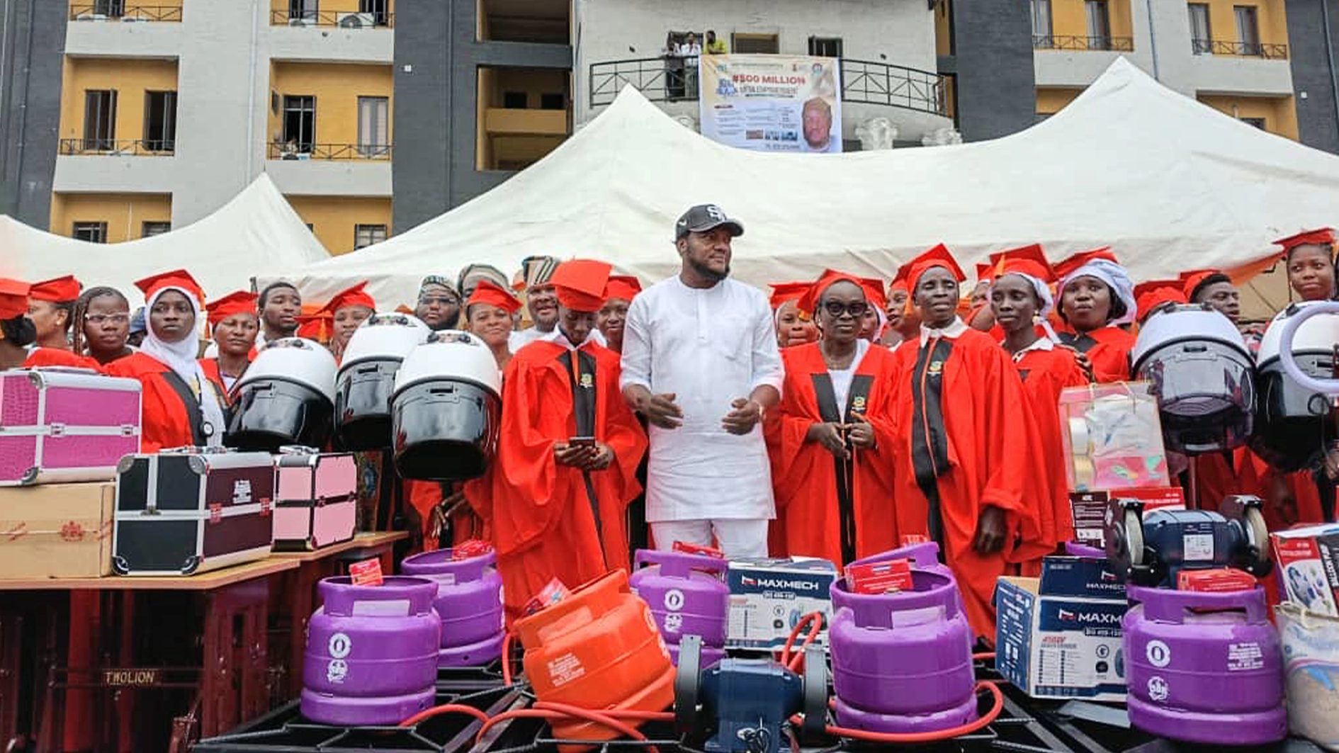 The Executive Chairman of Odi-Olowo/Ojuwoye Local Council Development Area (LCDA), Dr. Oluseyi Jakande presenting tools to graduates of skill acquisition centre recently…