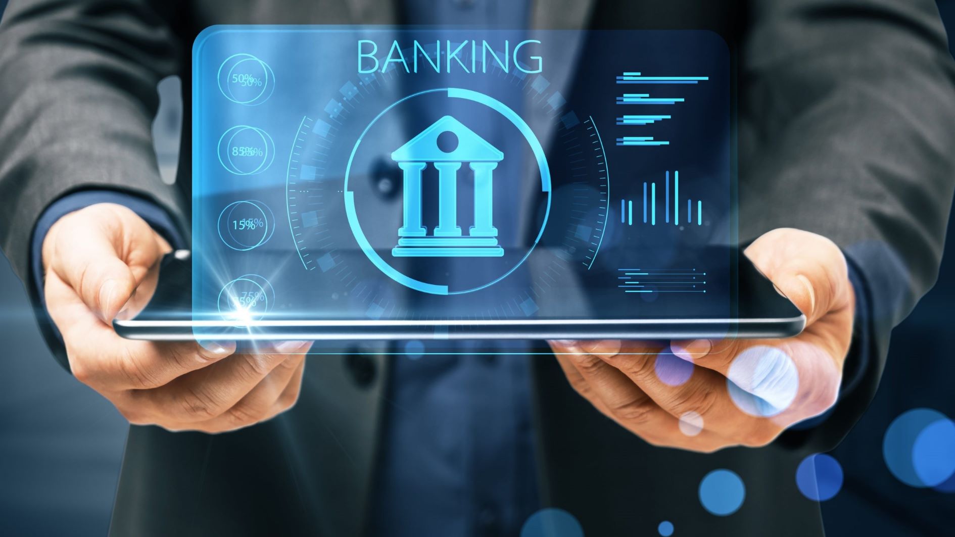 online-banking-concept-with-digital-classic-bank-building-symbol-laptop-monitor-businessman-hands-min-scaled-1