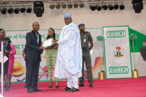 Aniedi Effiong receives the CODET national Group Category award during the 25th COREN Engineering Assembly in Akure, Ondo State, in August 2016.