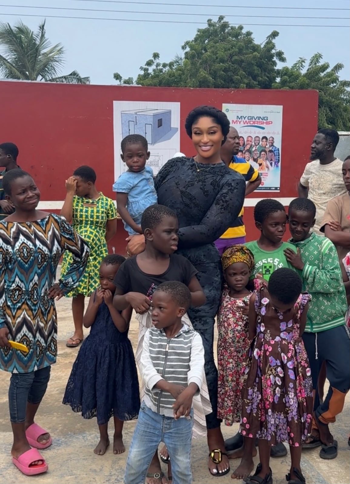 Chinyere Christy Ibekwe with children at a community event in Lagos
