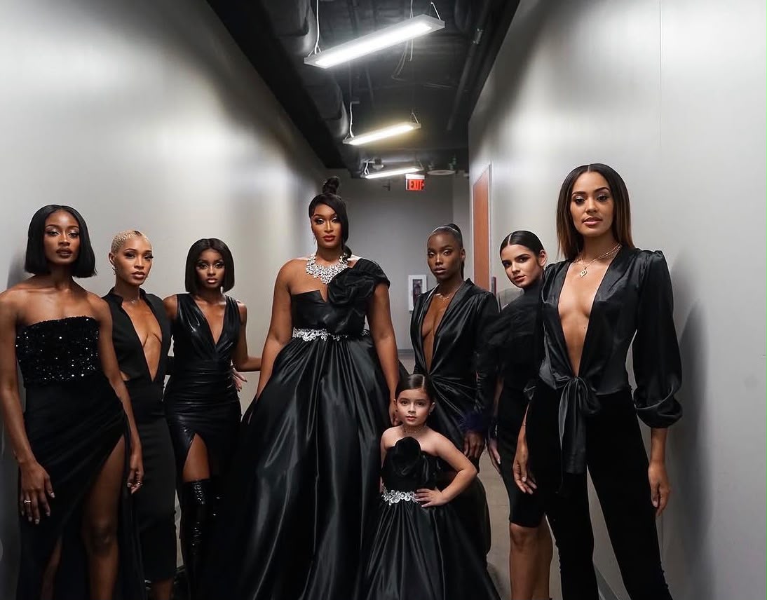 Fashion designer Chinyere Ibekwe (centre) with models wearing her designs.