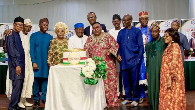 DG NCC, Dr John Asein and Pioneer DG (1989-2000), Mr Moses F. Ekpo, MFR, joined by retired directors in cutting the special send-off cake
