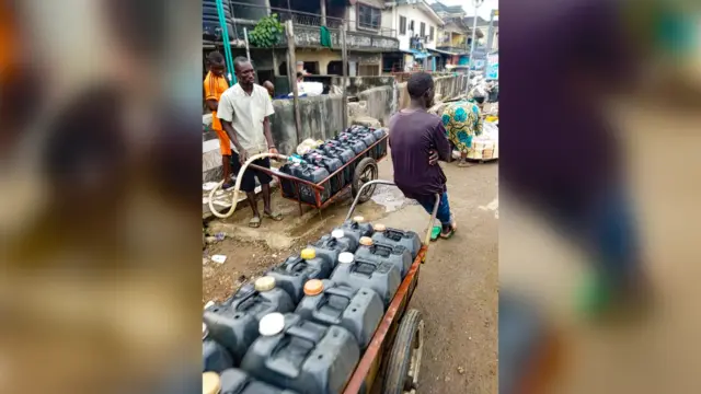 Water vendors at  Saka Street in Shogunle, Oshodi at the weekend.                                                                                             PHOTO: AYONOTE CLEMENT