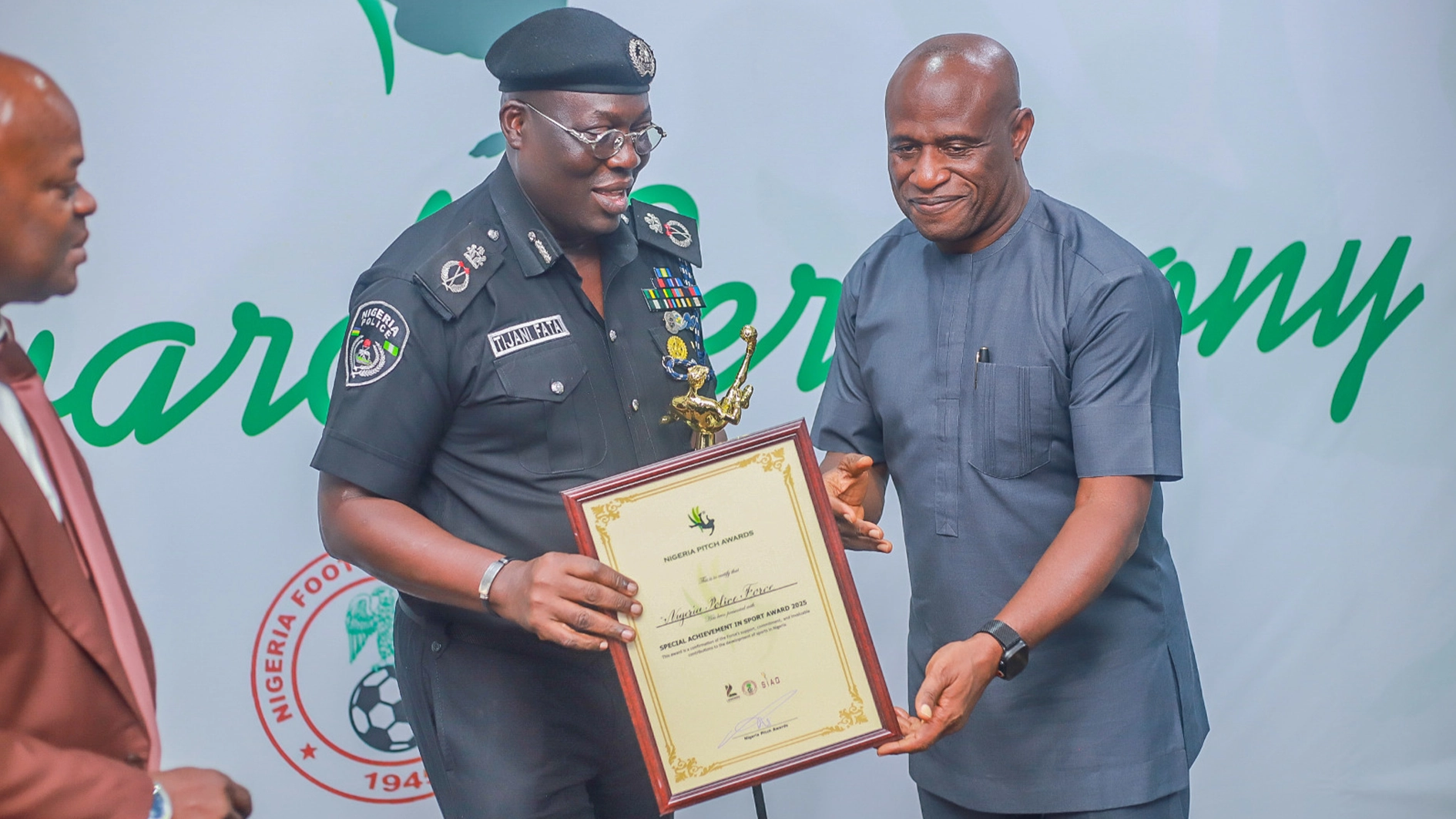 Nigeria Pitch Awards President, Shina Philips (right), presenting the Special Achievement in Sports Award to representative of the Lagos Commissioner of Police, Fatai Tijani, at the awards ceremony, recently.