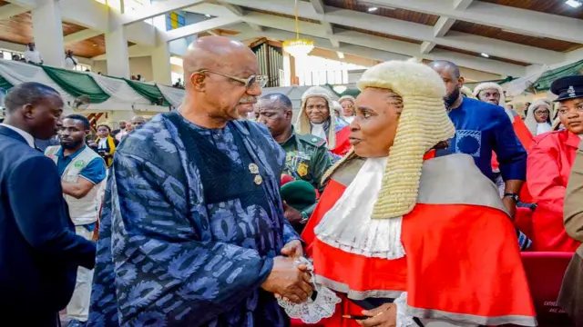 Ogun State Governor Dapo Abiodun with a judiciary officer`