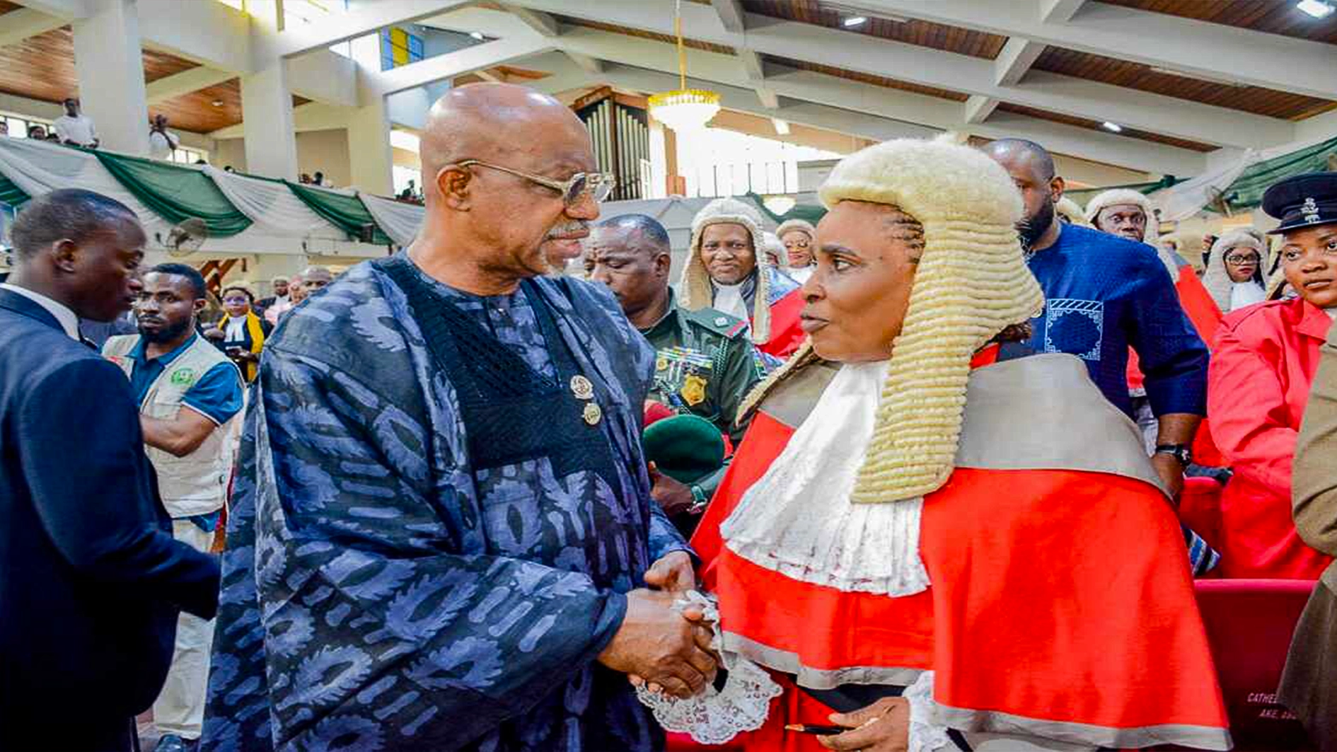 Ogun State Governor Dapo Abiodun with a judiciary officer`
