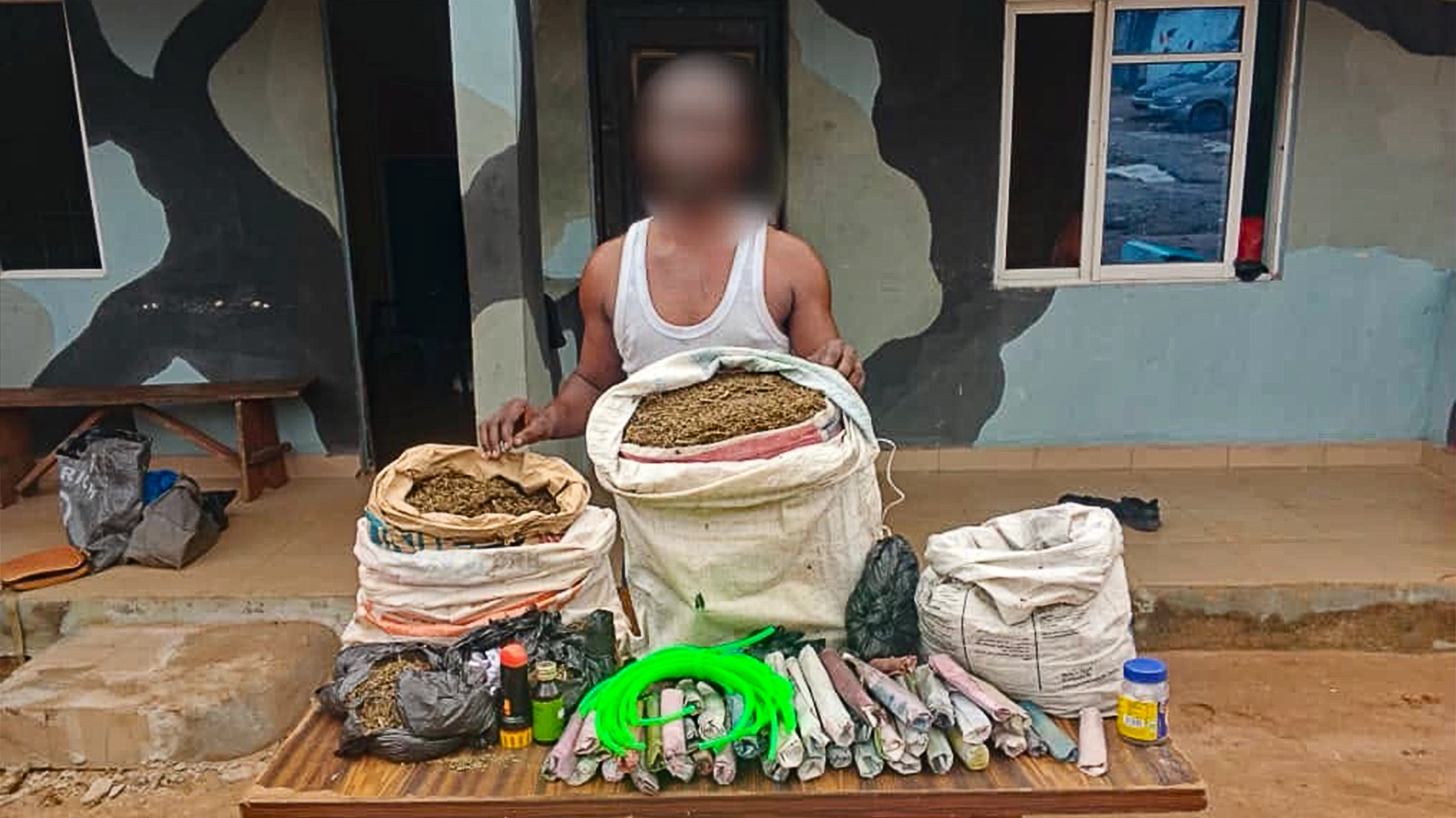 Suspect with recovered illicit drugs.