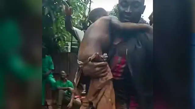 A victim rescued from the collapsed building  rubble