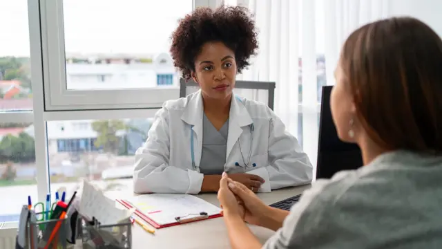 Patient talking to a doctor
