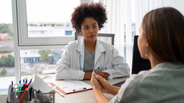 Patient talking to a doctor