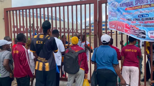 The protesting Oyo athletes at the Adamasingba Stadium gate yesterday.