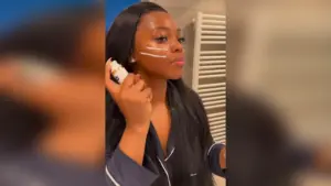 A lady using beauty product