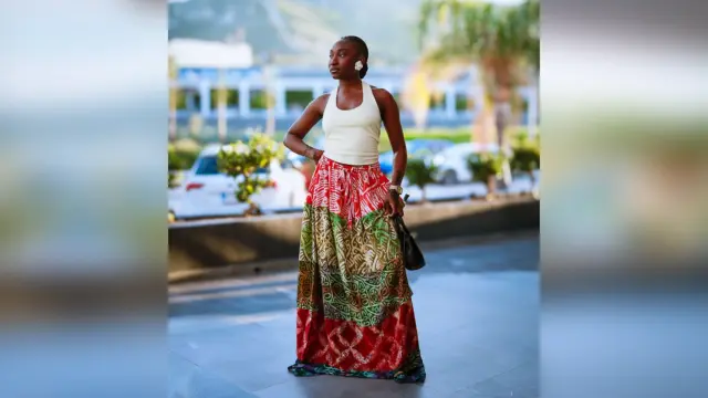 Young woman wearing long skirt